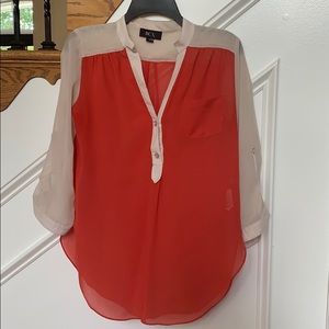 BCX size medium. Orange and white shirt!